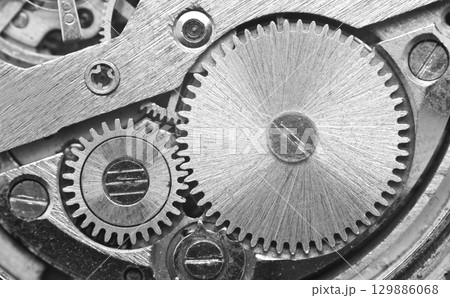 Manufacturing or industrial background Concept Teamwork or idea Technology. Gears cogs in clockwork. 129886068