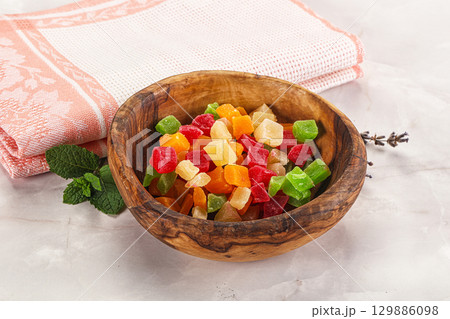 Sweet candied papaya colorful pieses 129886098