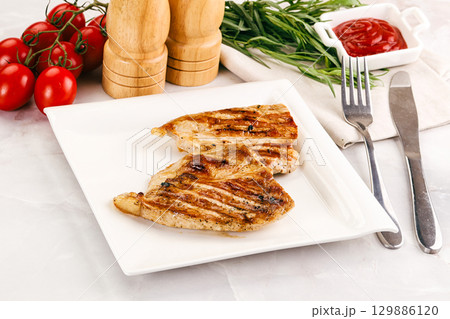 Grilled pork steak with sauce 129886120