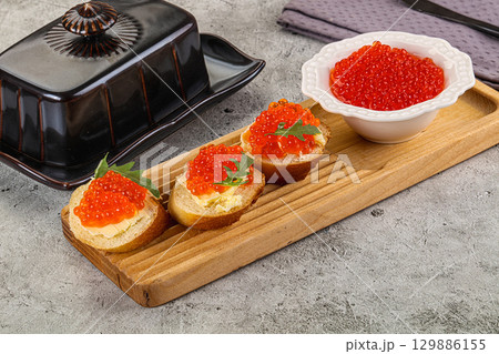 Luxury toast with red caviar 129886155