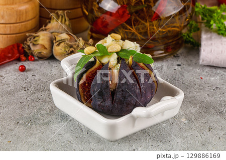 Fig with blue cheese and cedar Fig with blue cheese and cedar 129886169
