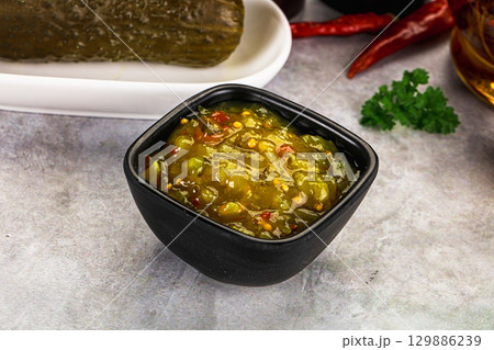 Souce gherkin relish with marinated cucumbers Souce gherkin relish with marinated cucumbers 129886239