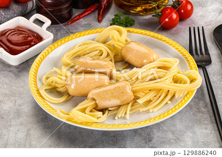 Dietary baby chicken sausage with spaghetti Dietary baby chicken sausage with spaghetti 129886240