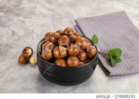Sweet macadamia nut in the bowl Sweet macadamia nut in the bowl 129886241