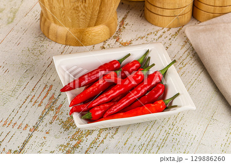 Red hot chili pepper heap Red hot chili pepper heap 129886260