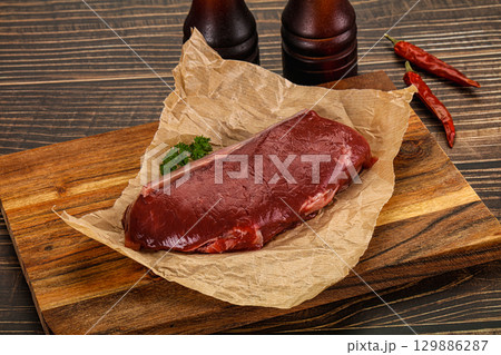 Raw beef striploin steak for grill Raw beef striploin steak for grill 129886287