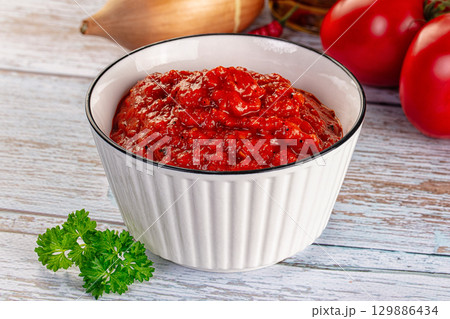 Bulgarian traditional lutenica pepper sauce Bulgarian traditional lutenica pepper sauce 129886434