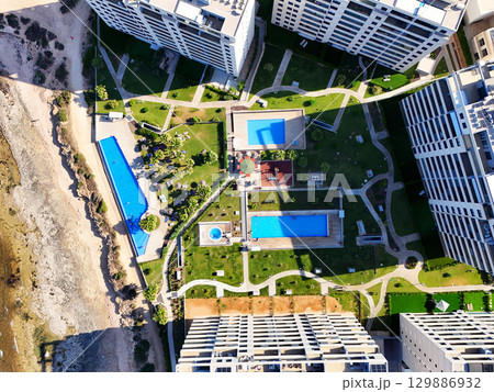 Aerial view of Punta Prima coastline. Spain Aerial view of Punta Prima coastline. Spain 129886932