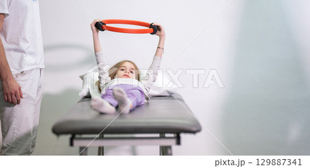 Child Doing Physical Therapy with Ring Child Doing Physical Therapy with Ring 129887341