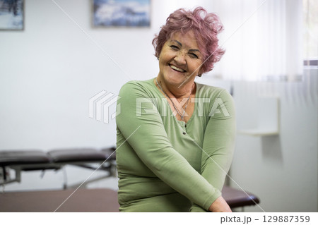 Smiling Elderly Woman in Physiotherapy Room Smiling Elderly Woman in Physiotherapy Room 129887359