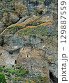 Dzivgis fortress is the largest rock cave fortress in the Caucasus. Russia, North Ossetia 129887559