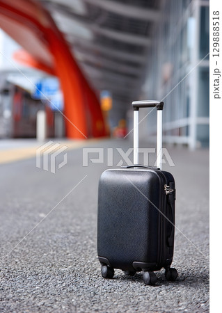 smart luggage tracking device used at airport car pickup 129888518