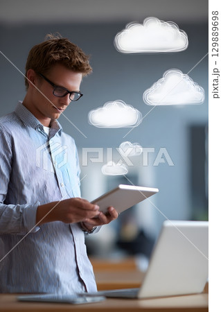 IT engineer supporting business cloud services on portable devices IT engineer supporting business cloud services on portable devices 129889698