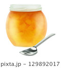 Open glass jar with orange or apricot fruit jam isolated on white background 129892017