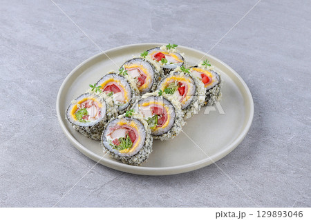Crispy Tempura Sushi Rolls with Crab Stick, Cheese, and Vegetables 129893046