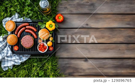 A vibrant grill showcasing hot dogs and hamburgers, ideal for summer outdoor activities and barbecues A vibrant grill showcasing hot dogs and hamburgers, ideal for summer outdoor activities and barbecues 129896765