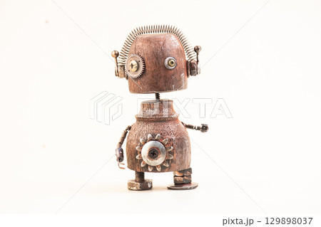Wooden robot toy on isolated background Wooden robot toy on isolated background 129898037