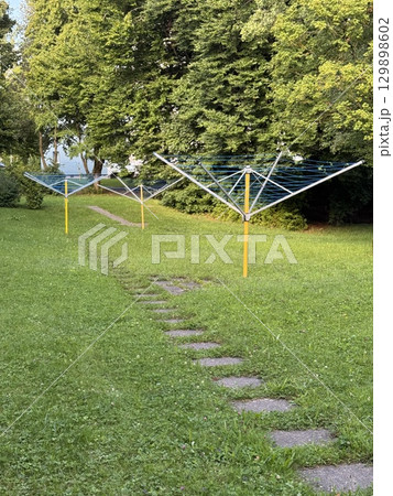 Discovering Playground Equipment in a Beautiful Green Park Environment for All Ages and Fun 129898602