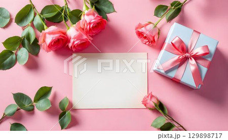 A lively arrangement of pink flowers placed on a coordinating pink background, perfect for honoring Mother's Day 129898717