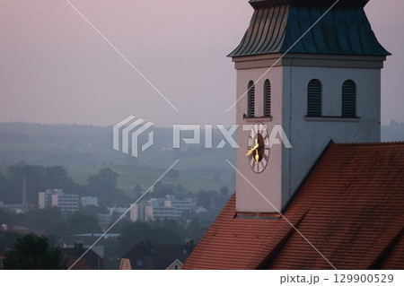 Clock tower with a clock face showing the time of 10:30 Clock tower with a clock face showing the time of 10:30 129900529