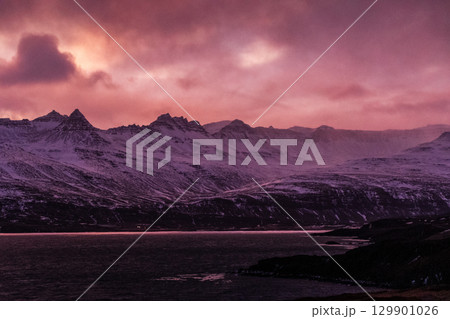 Golden hour along iceland's south coast 129901026