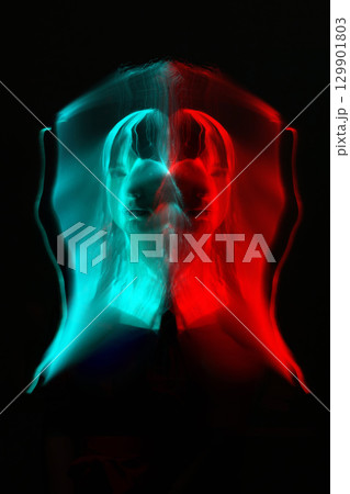 Woman portrait of light painting technique trails in RGB split style Woman portrait of light painting technique trails in RGB split style 129901803