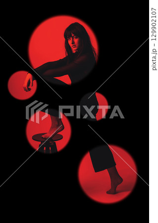 Woman portrait with dark hairs and clothes with one leg on chair Woman portrait with dark hairs and clothes with one leg on chair 129902107