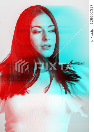 Close-up beautiful woman with long dark hair and headband portrait in RGB color split effect style Close-up beautiful woman with long dark hair and headband portrait in RGB color split effect style 129902517