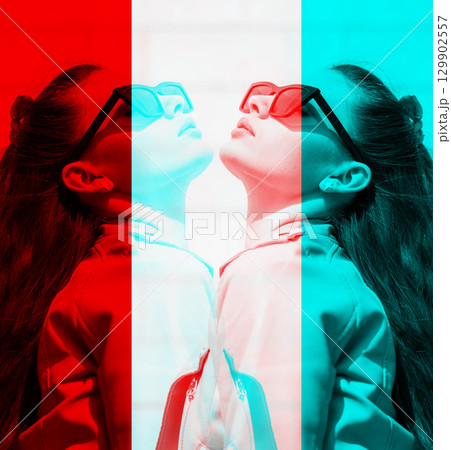 Beautiful woman with long dark hair and sunglasses outdoor close-up portrait 129902557