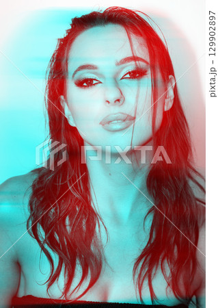 Beautiful woman with smokey make-up close-up studio portrait in RGB color split effect 129902897