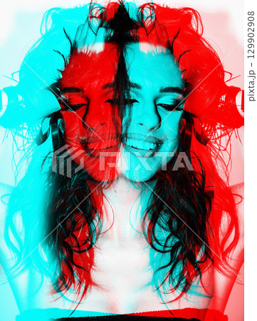 Beautiful woman with smokey makeup close up studio portrait in RGB color split effect Beautiful woman with smokey makeup close up studio portrait in RGB color split effect 129902908
