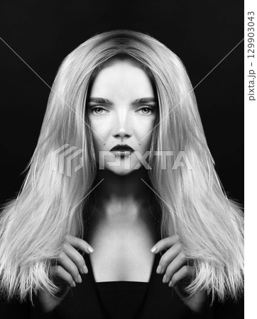 Fine art abstract blonde woman portrait in look like extraterrestrial being 129903043