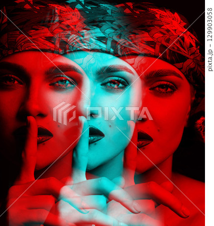 Beautiful woman with scarf on her head making silence gesture with finger in RGB color split effect 129903058