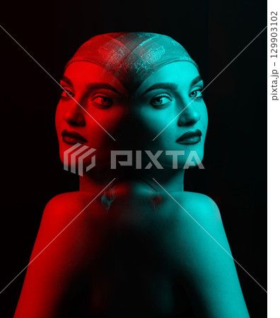 Woman with scarf on her studio portrait in RGB color split effect style 129903102