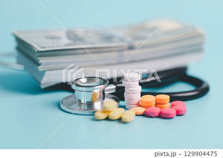 Expense of health care involves navigating pharmaceutical costs, prescription pills, medicine, finance, insurance, pharmacy support crucial roles in treating disease, covering necessary medicals. 129904475