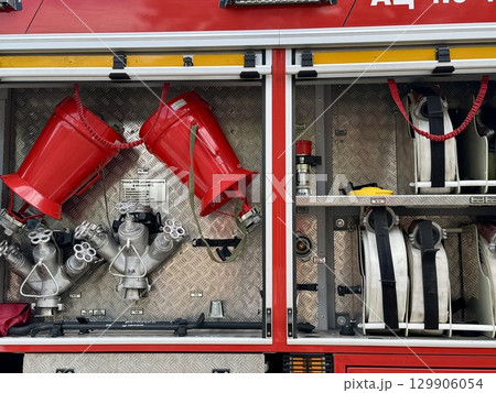 Fire technical armament of a fire truck. High quality photo 129906054