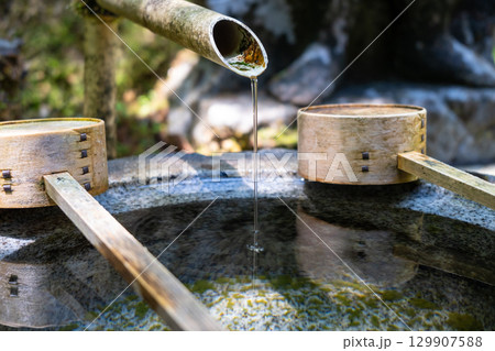 Hishaku ladle and chozuya fountain at Mitaki-Dera in Hiroshima 129907588