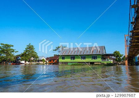 Suspension bridge crossing Lake Tempe in Sulawesi, Indonesia 129907607