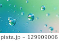 Floating water droplets blue green abstract background 129909006