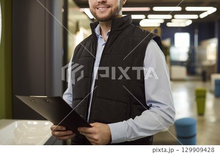Portrait Of Happy Salesman In Plumbing Shop 129909428