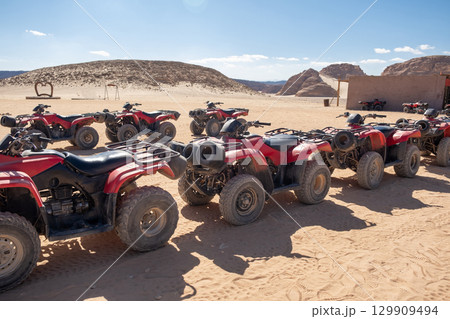 Explore the Sinai desert on a thrilling quad motorbike safari adventure near Sharm el Sheikh in Egypt 129909494