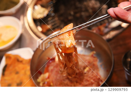 Korean noodle food. Bibim naengmyeon (cold buckwheat noodles) with Korean bbq meat 129909793