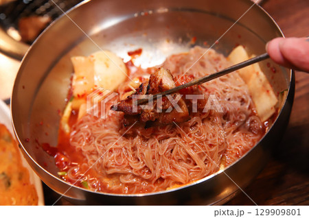 Korean noodle food. Bibim naengmyeon (cold buckwheat noodles) with Korean bbq meat 129909801