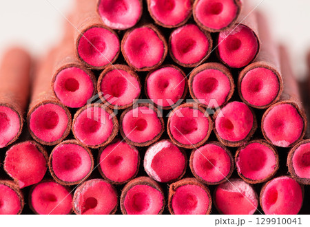 A bunch of firecrackers with red sulfur. Set of pyrotechnics, explosion hazard, macro. 129910041