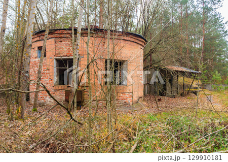 Old abandoned house in the ghost town Pripyat in Chernobyl Exclusion Zone, Ukraine 129910181
