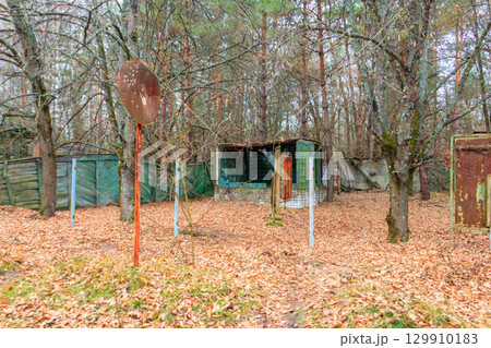 Old abandoned house in the ghost town Pripyat in Chernobyl Exclusion Zone, Ukraine 129910183