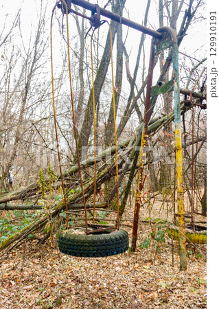 Abandoned children's playground in the ghost town Pripyat in Chernobyl Exclusion Zone, Ukraine 129910191