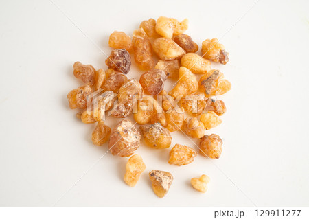 Frankincense or olibanum aromatic resin isolated on white background used in incense and perfumes. 129911277