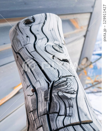 Detailed Close Up of Weathered Textured Wood Gray Color with Abstract Pattern 129911427