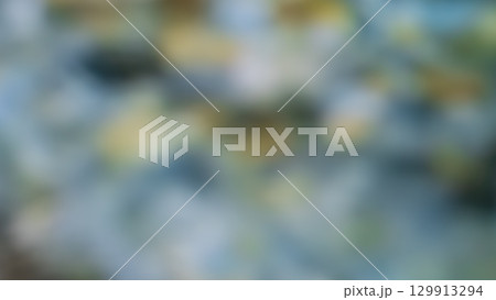 抽象的な青と黄色のボケ背景 写真素材 129913294